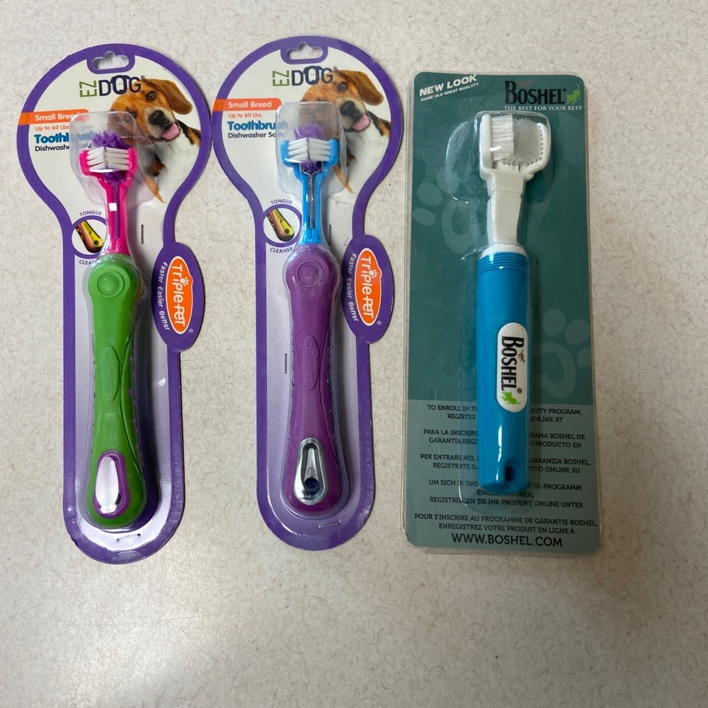 Three doggie toothbrushes NWOT